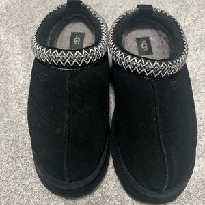 Woman’s UGG Taz II Black Suede Slip-Ons
